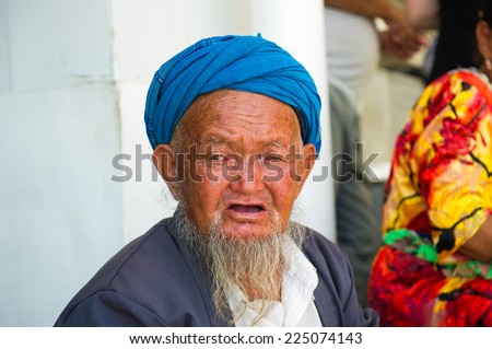 SAMARKAND, UZBEKISTAN - JUNE 10, 2011: Portrait of unidentified Uzbek man with beard and turban in Uzbekistan, Jun 10, 2011.  81% of people in Uzbekistan belong to Uzbek ethnic group