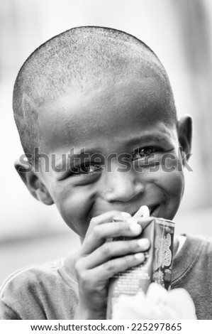 GUATEMALA CITY, GUATEMALA - JANUARY 3, 2012: Portrait of unidentified smiling boy in Guatemala. 59.4% of Guatemala people belong to the Mestizo ethnic group