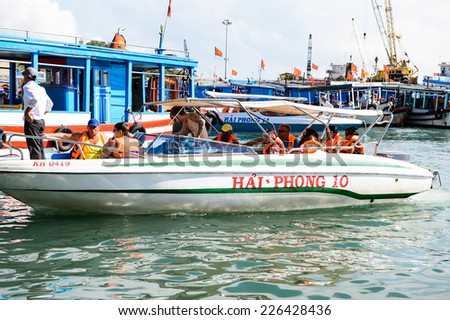 NHA TRANG, VIETNAM - SEP 30, 2014: Boats at the port of Nha Trang on the South China Sea, Vietnam. South China Sea is 3,500,000 square kilometres