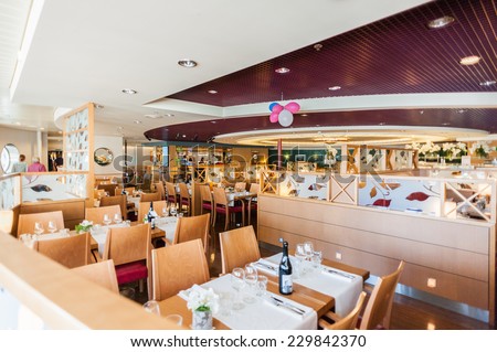 STOCKHOLM, SWEDEN - SEP 7, 2014: Restaurant at the Cruiseferry of the Estonian company Tallink. It is one of the largest passenger and cargo shipping companies in the Baltic Sea region