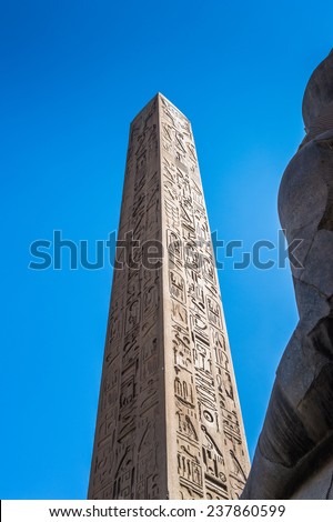 Red granite obelisk of the Luxor Temple, a large Ancient Egyptian temple, East Bank of the Nile, Egypt. UNESCO World Heritage
