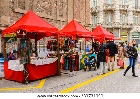 LUGANO, SWITZERLAND - DEC 24, 2014: Christmas tent on a Christmas market in the centre of Lugano. These Christmas markets   started from the Late Middle Ages in  Germany, Austria