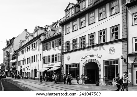 ERFURT, GERMANY  - JUN 16, 2014: One of the central streets of the city of Erfurt, Germany. Erfurt is the Capital of Thuringia and the city was first mentioned in 742