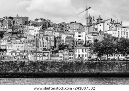 PORTO, PORTUGAL - JUN 21, 2014: Coast of the River Douro with its beautiful architecture in Porto, Portugal. View from the River Douro, one of the major rivers of the Iberian Peninsula (2157 m)