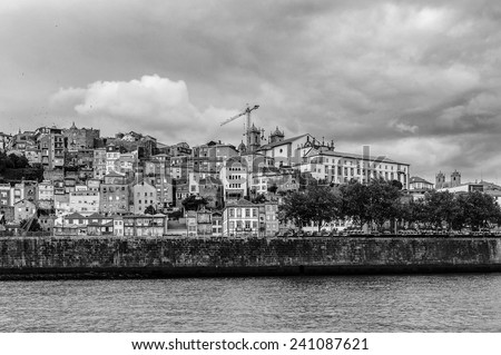 PORTO, PORTUGAL - JUN 21, 2014: Coast of the River Douro with its beautiful architecture in Porto, Portugal. View from the River Douro, one of the major rivers of the Iberian Peninsula (2157 m)