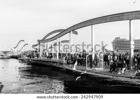 BARCELONA, SPAIN - MAR 15, 2014: Bridge of the Port Vell, the harbor in Barcelona,  built as part of an urban renewal program prior to the 1992 Barcelona Olympics.