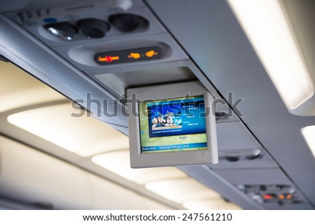 ZURICH, SWITZERLAND - JAN 26, 2015: Portable screen in the plane of the Swiss International Air Lines,  flag carrier airline of Switzerland