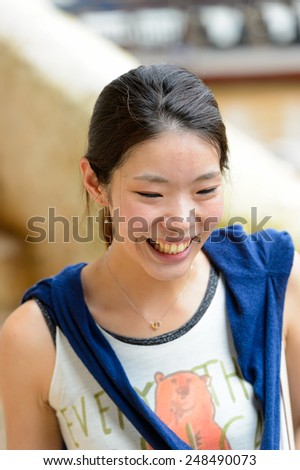 LUANG PRABANG, LAOS - SEP 25, 2014: Unidentified Lao smiling woman portrait. 55% of Laos people belong to the Lao ethnic group