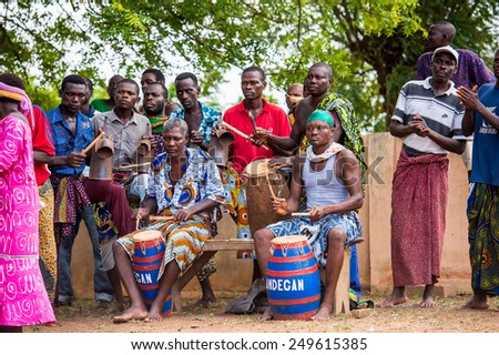 KARA, TOGO - MAR 9, 2013: Unidentified Togolese local musicians play for the people around. People in Togo suffer of poverty due to the unstable econimic situation