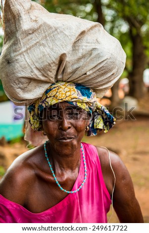KARA, TOGO - MAR 9, 2013: Unidentified Togolese woman with a bag over her head. People in Togo suffer of poverty due to the unstable econimic situation