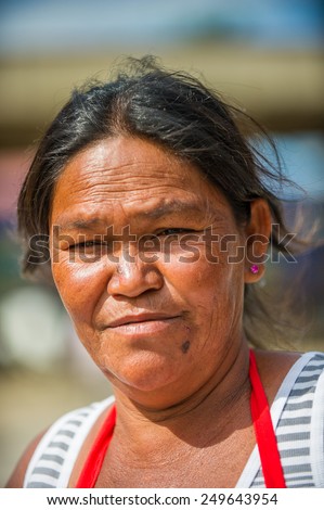 SAN JOSE, COSTA RICA - JAN 6, 2012: Unidentified Costa Rican woman tries to smile. 65.8% of Costa Rican people belong to the White (Castizo) ethnic group