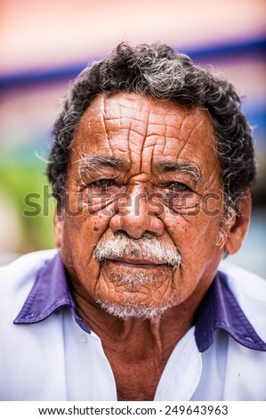 SAN JOSE, COSTA RICA - JAN 6, 2012: Unidentified Costa Rican  man with white mustache. 65.8% of Costa Rican people belong to the White (Castizo) ethnic group