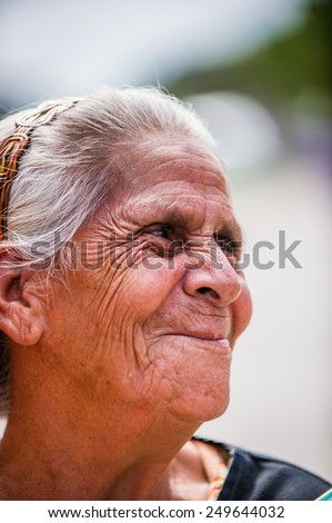 SAN JOSE, COSTA RICA - JAN 6, 2012: Unidentified Costa Rican smiling woman with white hair. 65.8% of Costa Rican people belong to the White (Castizo) ethnic group