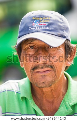 SAN JOSE, COSTA RICA - JAN 6, 2012: Unidentified Costa Rican man in a hat portrait portrait. 65.8% of Costa Rican people belong to the White (Castizo) ethnic group