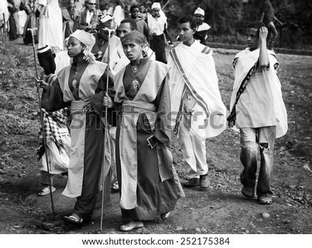 LALIBELA, ETHIOPIA - SEP 27, 2011: Unidentified Ethiopian people in bright clothes come to the Meskel festival in Ehtiopia, Sep 27, 2011. Meskel commemorates the finding of the True Cross