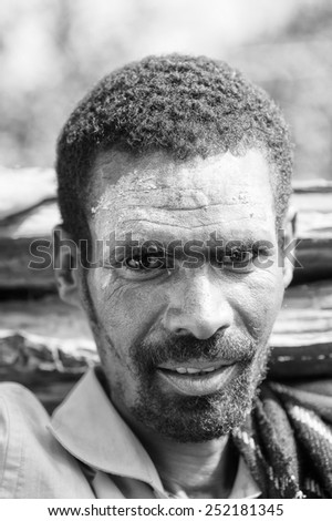 OMO VALLEY, ETHIOPIA - SEP 20, 2011: Portrait of and Unidentified Ethiopian man in white paste in Ethiopia, Sep.20, 2011. People in Ethiopia suffer of poverty due to the unstable situation