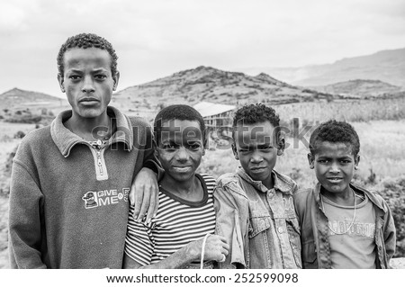 OMO, ETHIOPIA - SEPTEMBER 21, 2011: Unidentified Ethiopian young boys. People in Ethiopia suffer of poverty due to the unstable situation