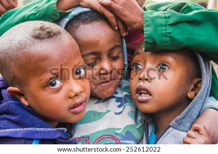 OMO, ETHIOPIA - SEPTEMBER 21, 2011: Unidentified Ethiopian children in the street. People in Ethiopia suffer of poverty due to the unstable situation