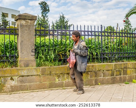 OMO, ETHIOPIA - SEPTEMBER 21, 2011: Unidentified Ethiopian man in the street. People in Ethiopia suffer of poverty due to the unstable situation