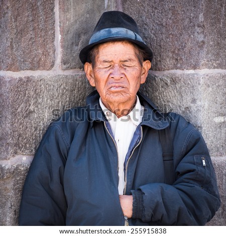 QUITO, ECUADOR - JAN 2, 2015: Unidentified Ecuadorian old man in the street. 71,9% of Ecuadorian people belong to the Mestizo ethnic group