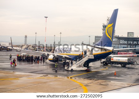 THESSALONIKI, GREECE - MAR 23, 2015: Ryanair aircraft in the Thessaloniki International Airport Macedonia. it\'s a hub for Aegean Airlines, Astra Airlines, Ellinair, Ryanair