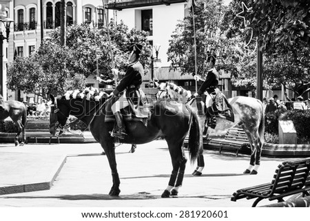 QUITO, ECUADOR - JAN 5, 2015: Unidentified Ecuadorian hussar on a horse during a parade in Quito 71,9% of Ecuadorian people belong to the Mestizo ethnic group