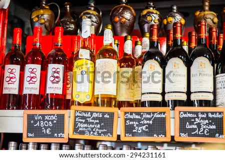 TROUVILLE, FRANCE - JUN 7, 2015:  Alcoholic drinks shop in Troville, the town in the Calvados Department of France. Too much alcohol is bad for the health