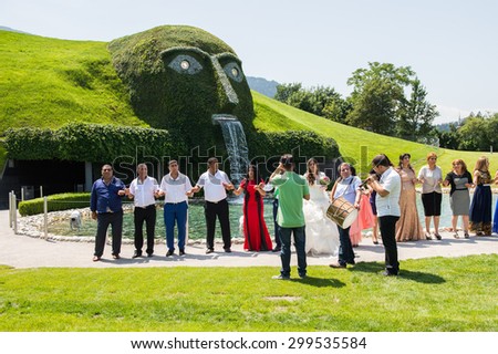 WATTENS, AUSTRIA - JULY 4, 2015: Unidentified arabic people celebrating a wedding and dancing. Dancing is one of the main parts of wedding in the arabic world