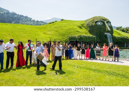 WATTENS, AUSTRIA - JULY 4, 2015: Unidentified arabic people celebrating a wedding and dancing. Dancing is one of the main parts of wedding in the arabic world