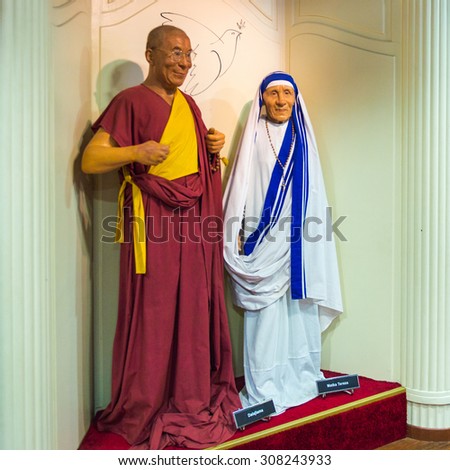 PRAGUE, CZECH REPUBLIC - JUNE 29, 2015: Dalaylama and Mother Therese in the Madame Tussaud museum in Prague. Madame Tussaud museum is the museum of the wax figures