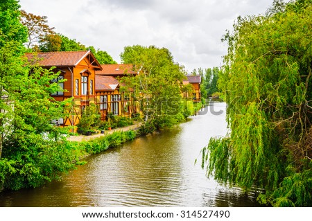 AMSTERDAM, NETHERLANDS - JUNE 1, 2015: Architecture of Amsterdam, Netherlands. Amsterdam is the capital of Netherlands and a popular touristic destination