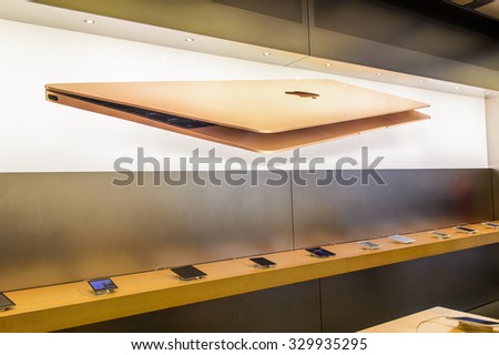 NEW YORK, USA - SEP 22, 2015: Unidentified people in the Apple store on the Fifth Avenue, New York. The store sells Macintosh personal computers, software, iPod, iPad, iPhone, Apple Watch, Apple TV