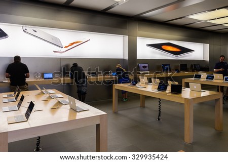 NEW YORK, USA - SEP 22, 2015: Interior of the Apple store on the Fifth Avenue, New York. The store sells Macintosh personal computers, software, iPod, iPad, iPhone, Apple Watch, Apple TV