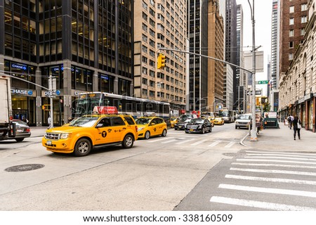 NEW YORK, USA - SEP 22, 2015: Taxi cab on the 6th avenue (Avenue of the Americas), 6 km long