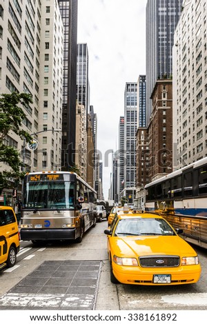 NEW YORK, USA - SEP 22, 2015: Taxi cab on the 6th avenue (Avenue of the Americas), 6 km long