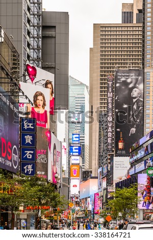 NEW YORK, USA - SEP 22, 2015: Billboards and posters at the Times Square, a major commercial neighborhood in Midtown Manhattan, New York City