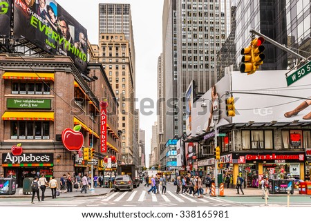 NEW YORK, USA - SEP 22, 2015: Billboards and posters at the Times Square, a major commercial neighborhood in Midtown Manhattan, New York City