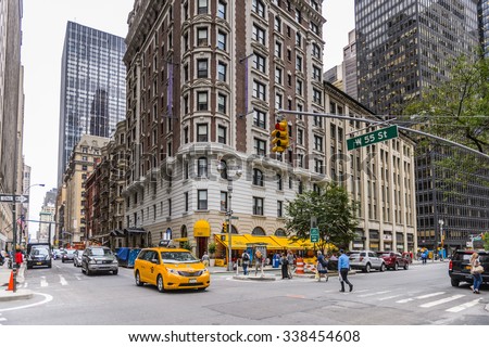 NEW YORK, USA - SEP 22, 2015: Taxi cab at the Broadway street. It is the oldest north south main thoroughfare in New York City