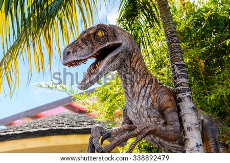 LOS ANGELES, USA - SEP 27, 2015: Velociraptor in Jurassic Park area in the Universal Studios Hollywood Park. Jurassic Park is a 1993 American adventure film  by Steven Spielberg
