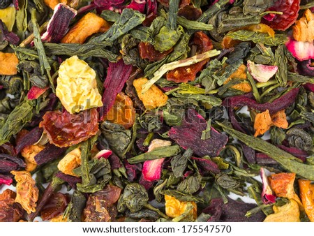Background of tea with flowers and fruit