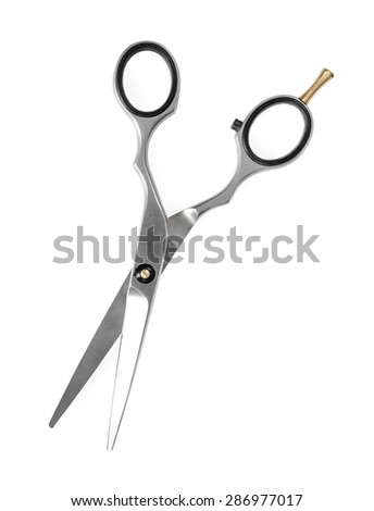 Metal scissors for cutting hair isolated on white background