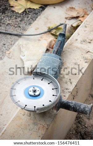 Electrical stone cutter. Horizontal version's ID is: 156477206.