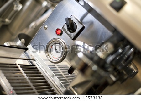 A Temperature gauge on a coffee machine.