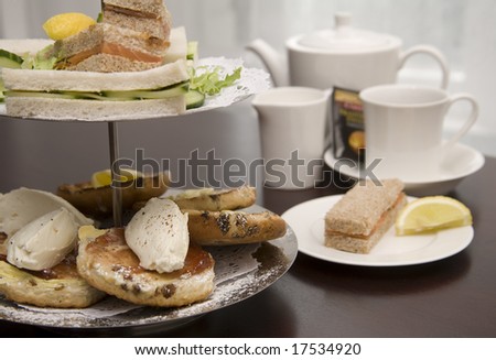 An arrangement of sandwiches and scones for afternoon tea