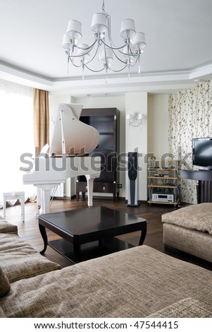 Interior of luxury light living room with white piano