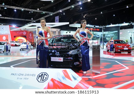 BANGKOK - MARCH 26 :MG 6 car with Unidentified model   on display at The 35th Bangkok International Motor Show 2014 on March 26, 2014 in Bangkok, Thailand