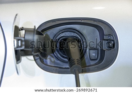 Nonthburi,Thailand - April 02, 2015: Charging dock with Porsche universal charger (AC) is like a private filling station,showed in Thailand the 36th Bangkok International Motor Show on 02 April 2015