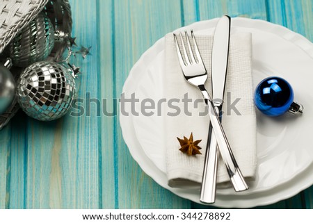 Christmas dinner table. Traditional Christmas decorations. Romantic table setting.