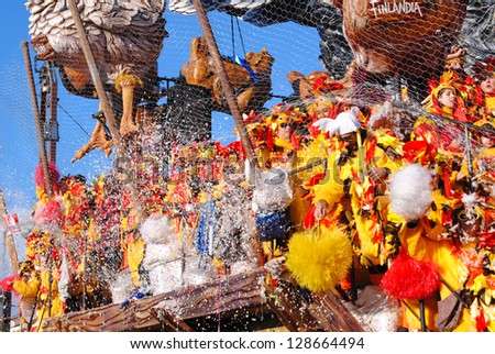 VIAREGGIO, ITALY - 10 FEBRUARY 2013 : Festival,the parade of carnival floats with dancer on streets of Viareggio, February 10, 2013 in Viareggio,Italy