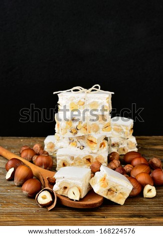 Turron or nougat artisan pastry background, your text here.Typical italian sweets.